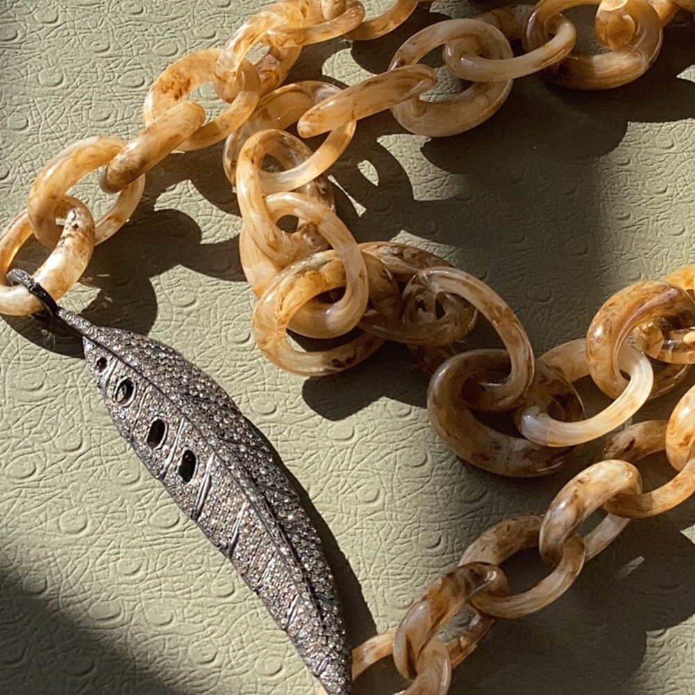 Designer resin link necklace with a stunning pave diamond 3D feather accent